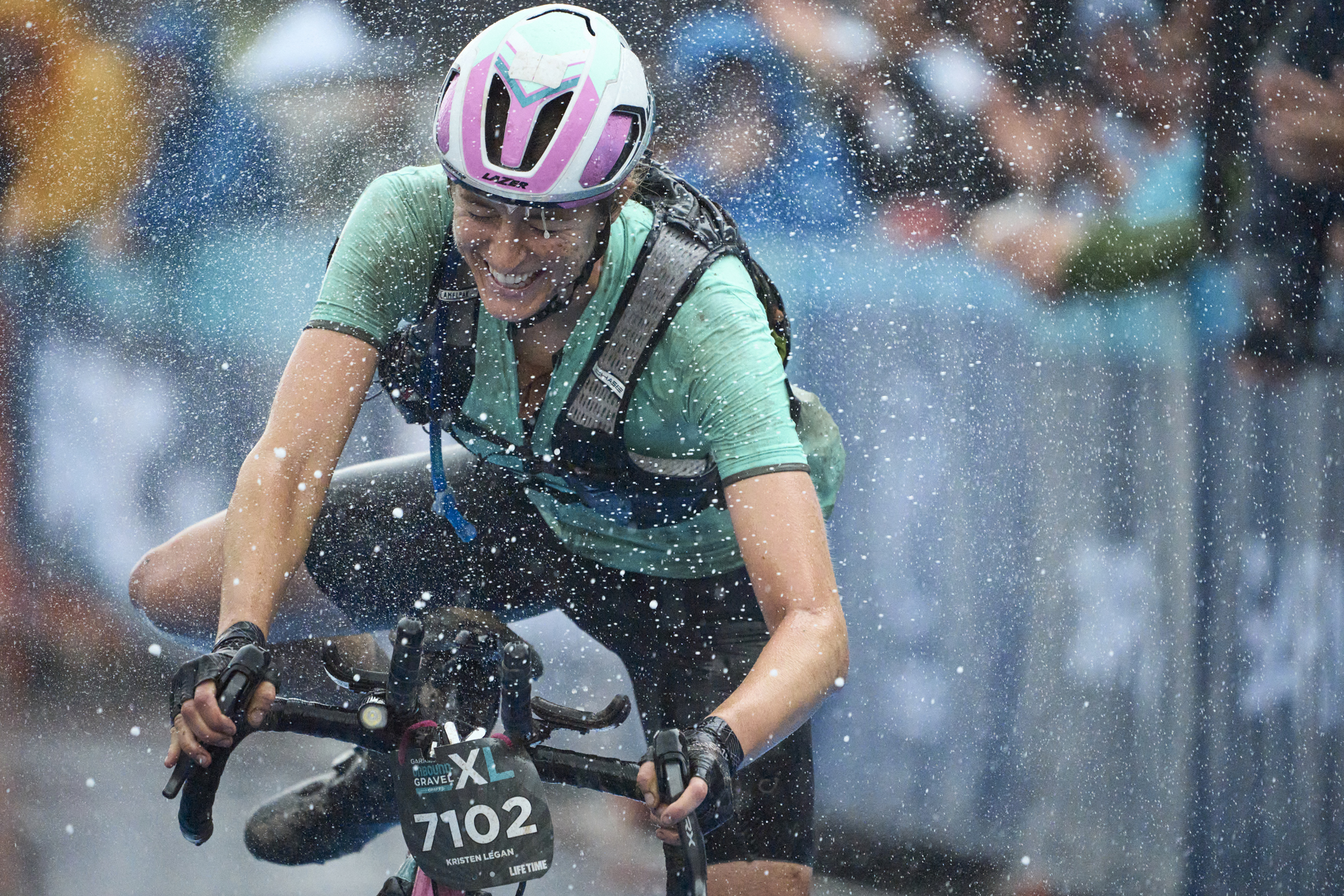 Kristen Legan winning the 2023 Unbound XL gravel bike race