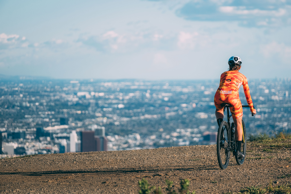 Izy King riding her grave bike with LA in the background