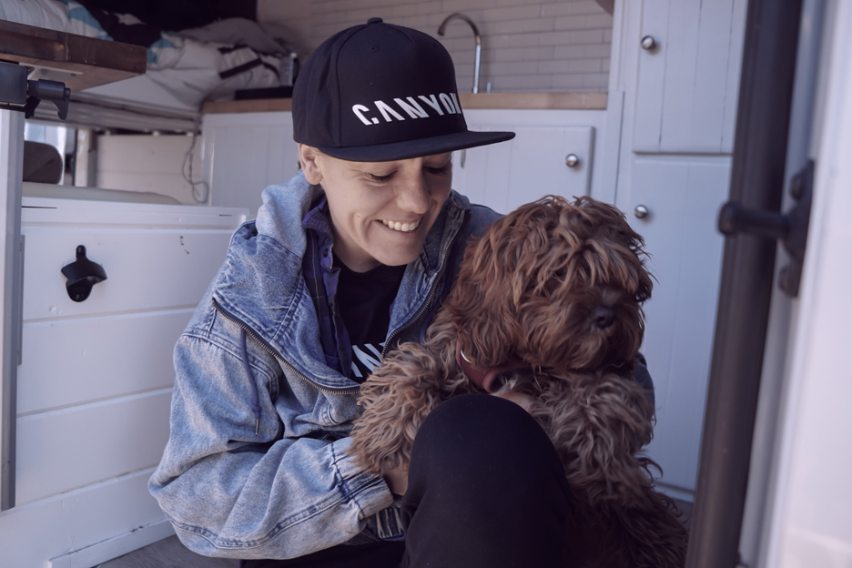 heather Jackson petting her dog