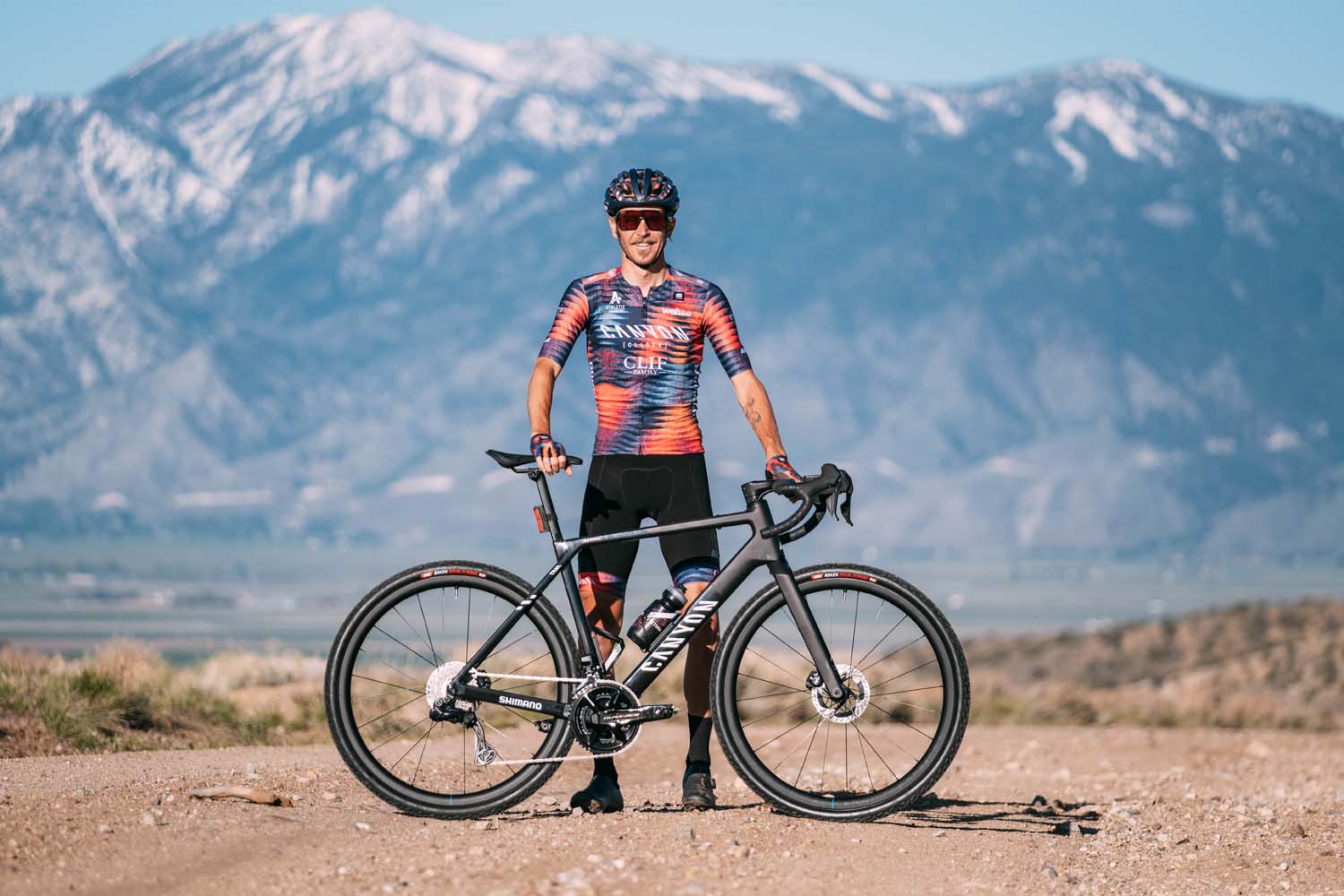 Peter Stetina standing with hi Shimano equipped Gravel bike